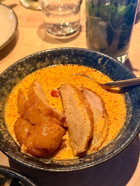 Bathing Duck, Grilled duck with tropical fruits in red curry